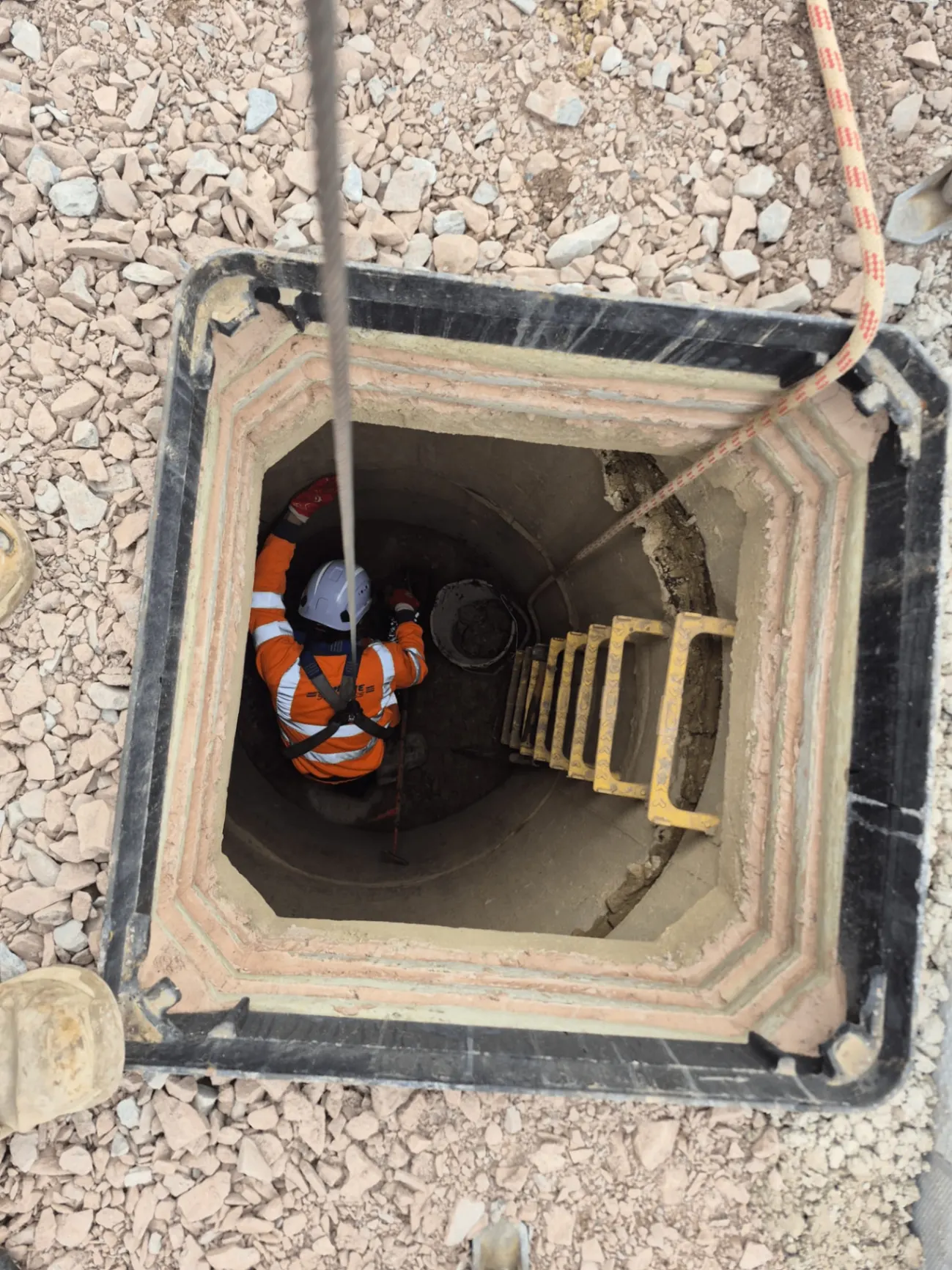 Man-entry concrete blockage removal from a drainage manhole on a Northamptonshire housing development