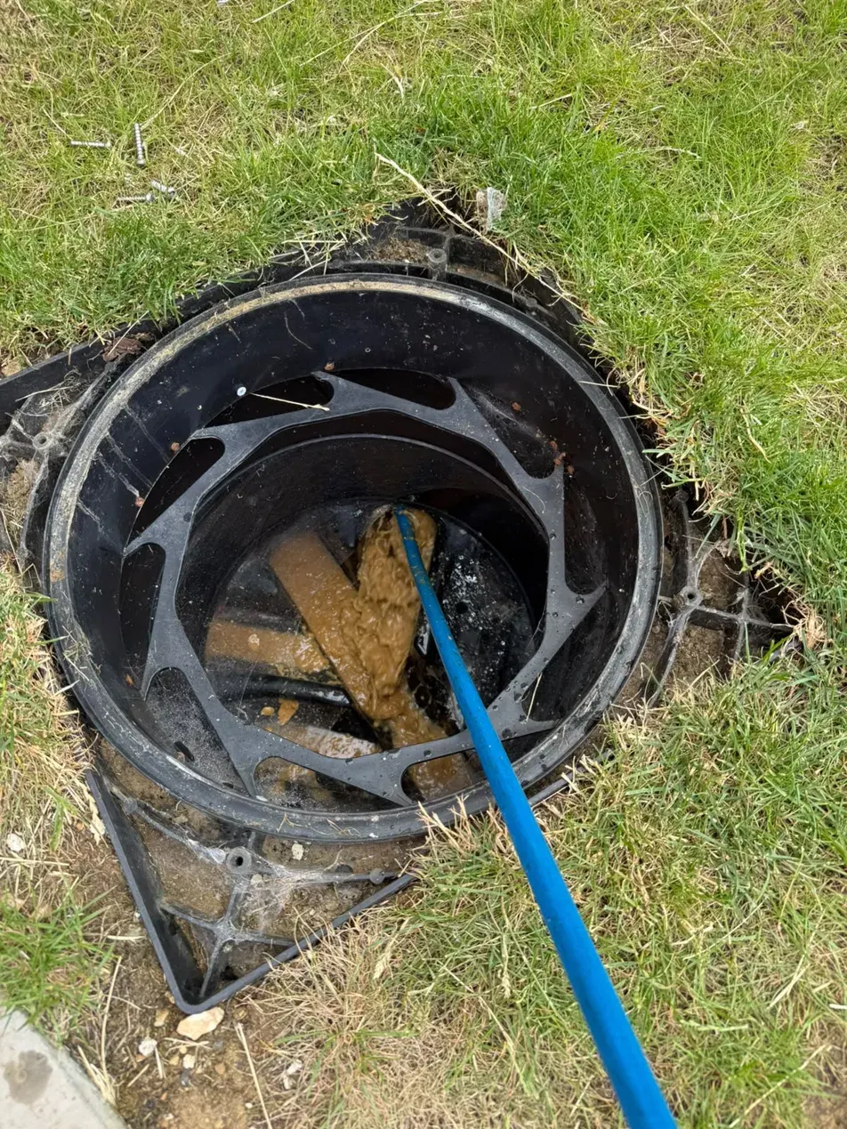 Blocked drain being cleared with jetter in Wellingborough, Northamptonshire